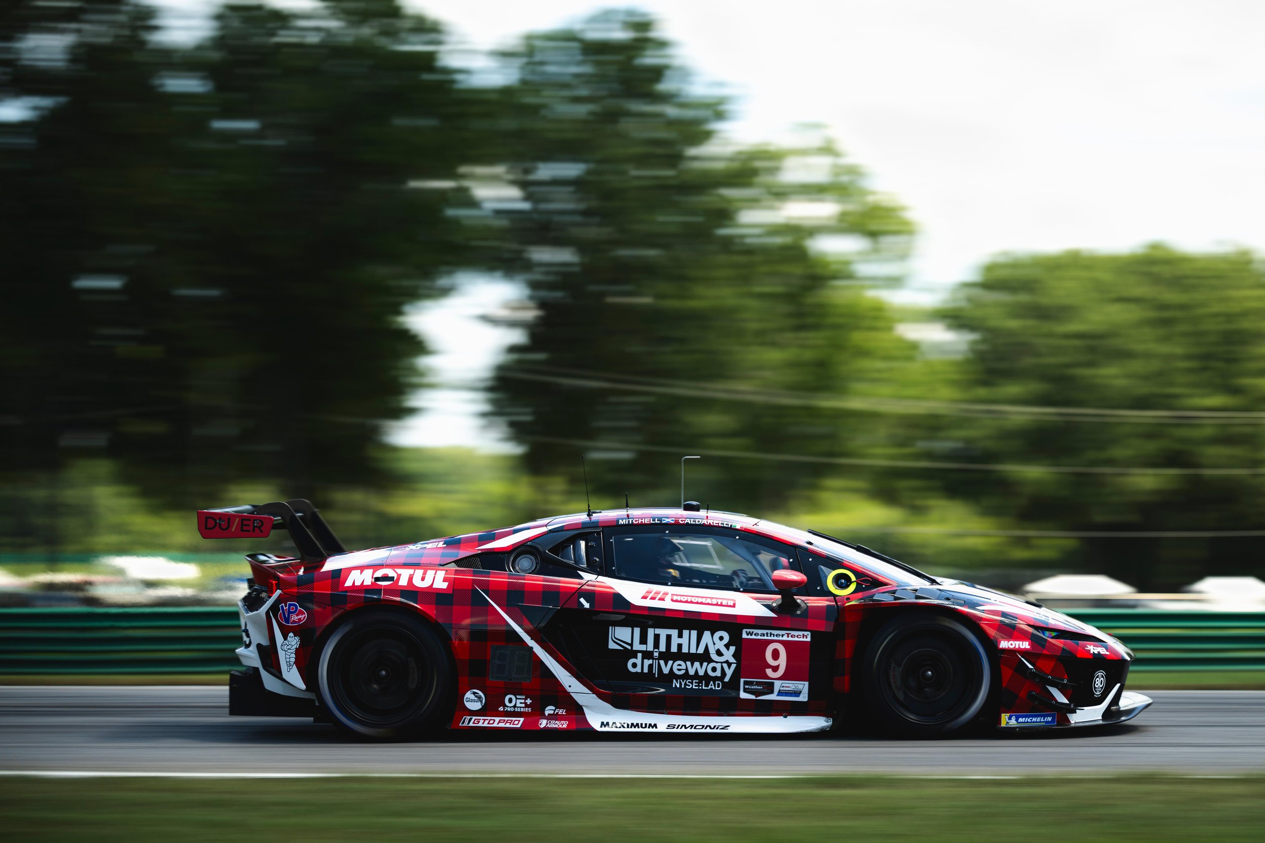 Lamborghini Temerario GT3 in Pfaff Motorsports livery at speed on the Virginia International Raceway circuit