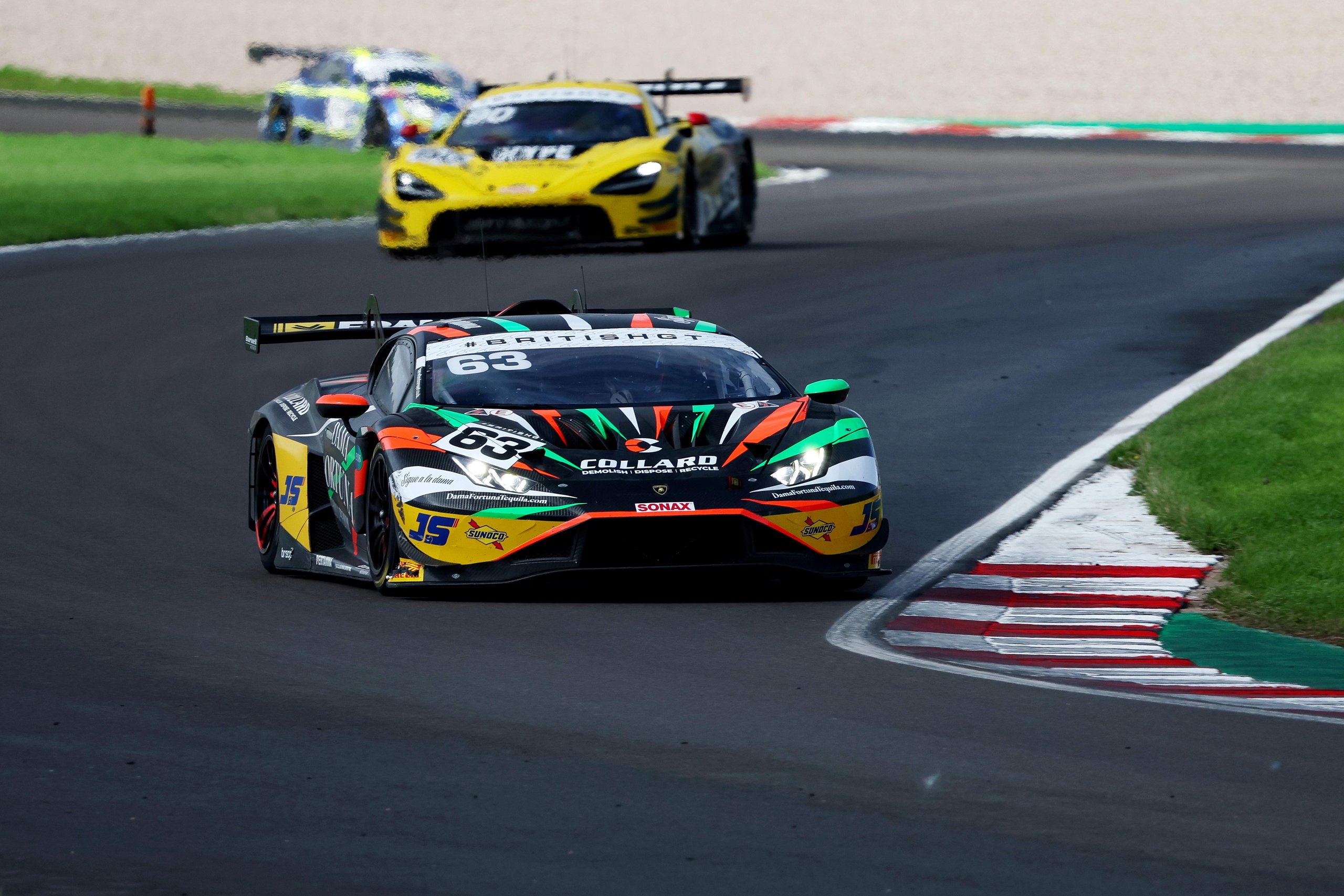 Lamborghini Huracán GT3 EVO2 number 63 leading a competitor on track during a British GT race