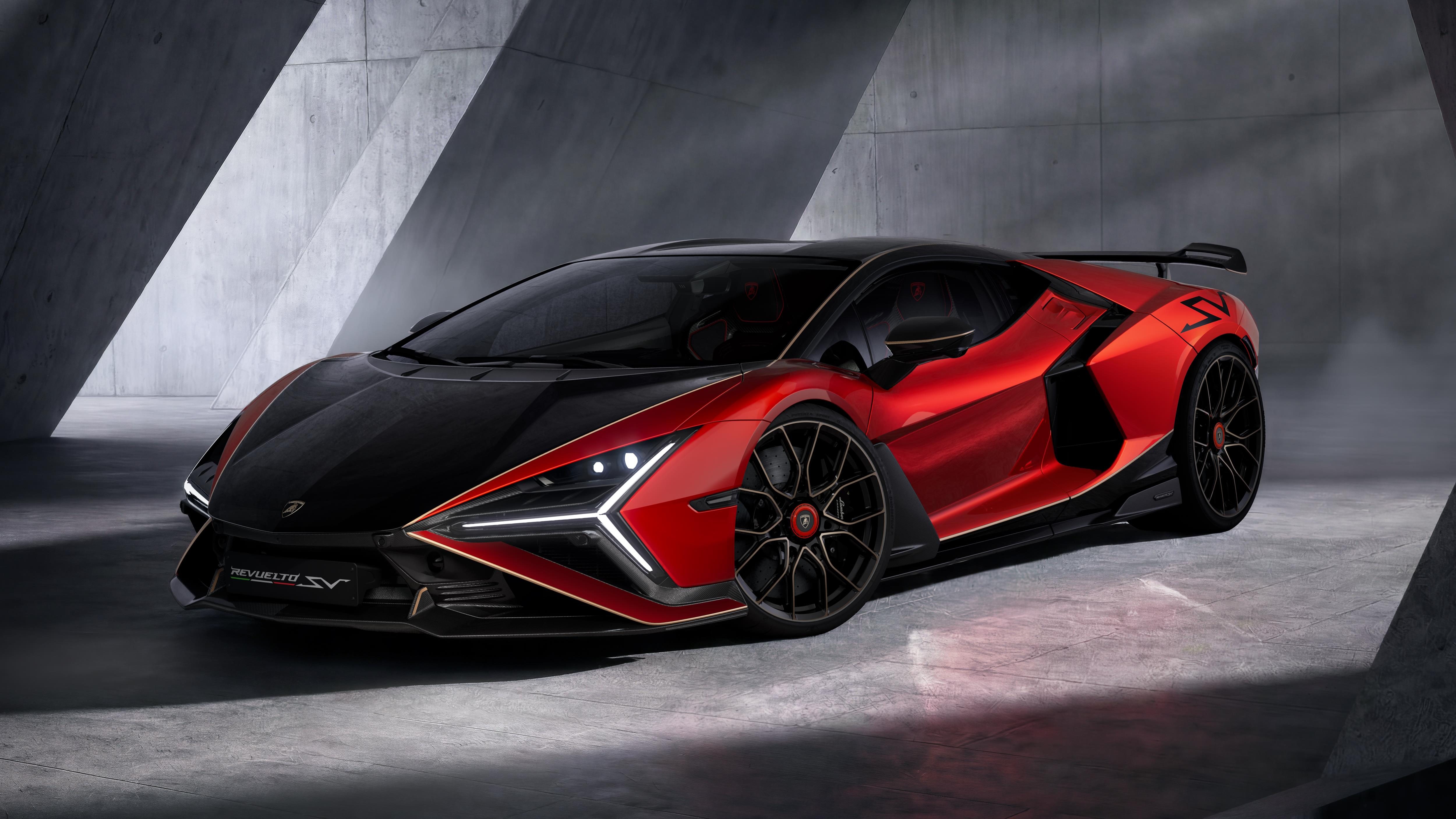 Red and black Lamborghini Revuelto SV front three-quarter view in studio, showing Y-shaped DRLs and aggressive aerodynamic bodywork